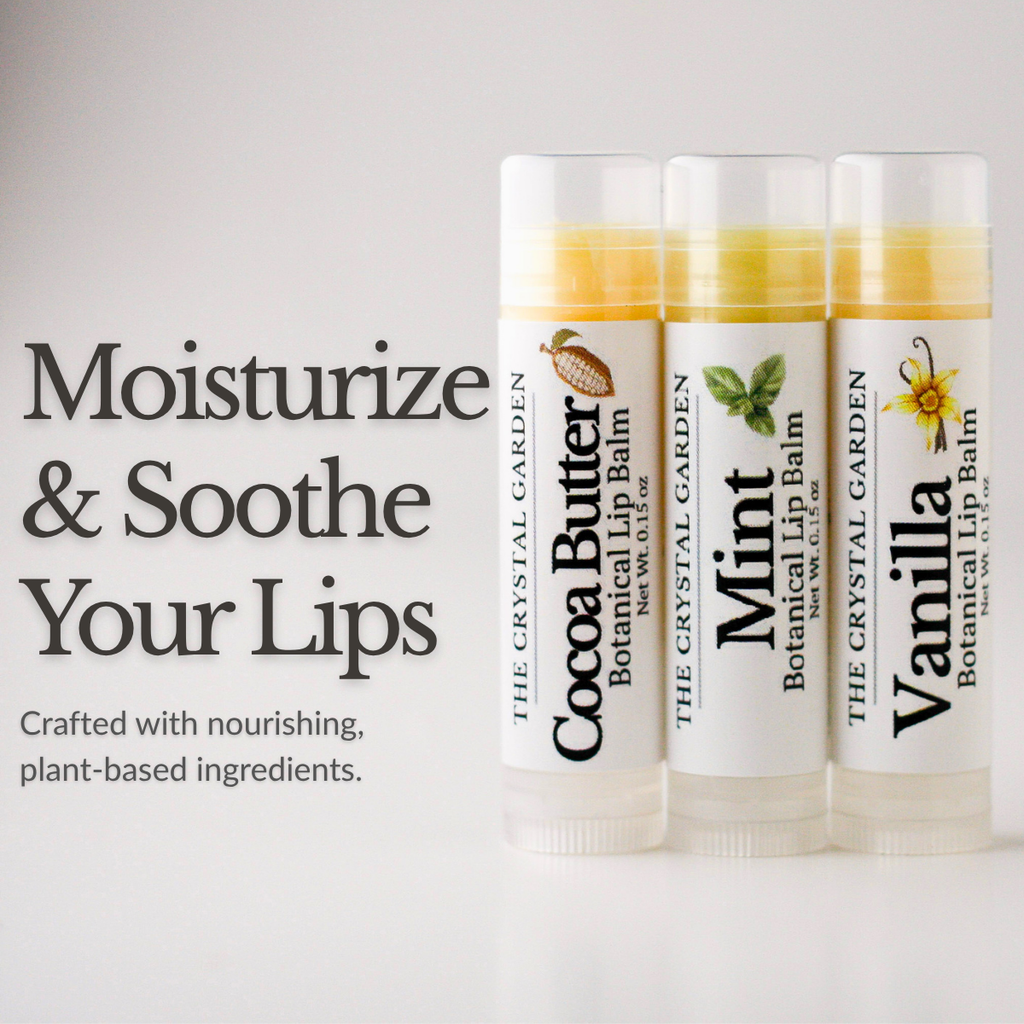 Three lip balm tubes labeled Cocoa Butter, Mint, and Vanilla by The Crystal Garden are shown on a light gray background with promotional text reading 'Moisturize & Soothe Your Lips.'.