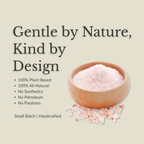 Promotional graphic for a handcrafted pink salt product, featuring a small wooden bowl filled with pale pink salt crystals on a light beige background. Text reads 'Gentle by Nature, Kind by Design' with bullet points highlighting plant-based, all-natural, and synthetic-free qualities.