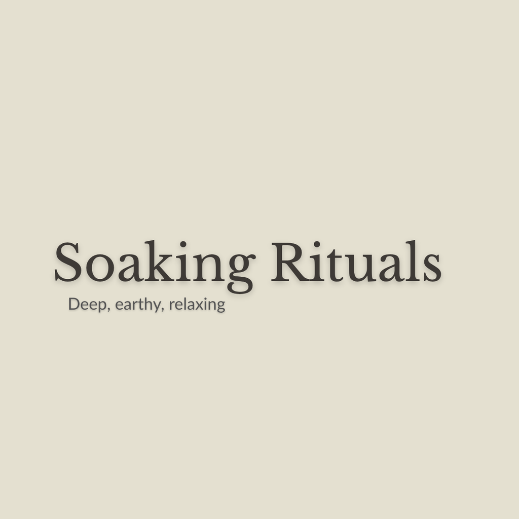 Minimal text reading 'Soaking Rituals' with the subtitle 'Deep, earthy, relaxing' on a plain warm beige background.
