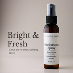 A 2 oz amber glass spray bottle of The Crystal Garden Deodorizing Spray in Pure Citrus scent, shown next to text that reads 'Bright & Fresh' and 'Citrus oils for clean, uplifting space' on a warm beige background.