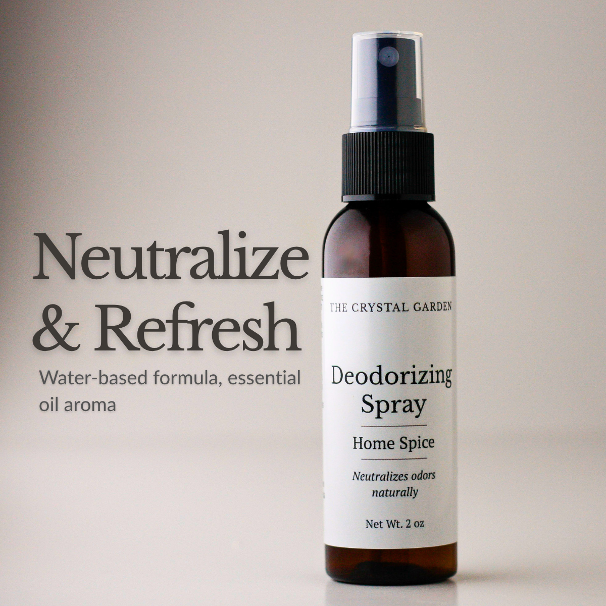 A 2 oz amber glass spray bottle of The Crystal Garden Deodorizing Spray with a black spray cap and white label, shown next to text that reads 'Neutralize & Refresh' on a warm beige background.