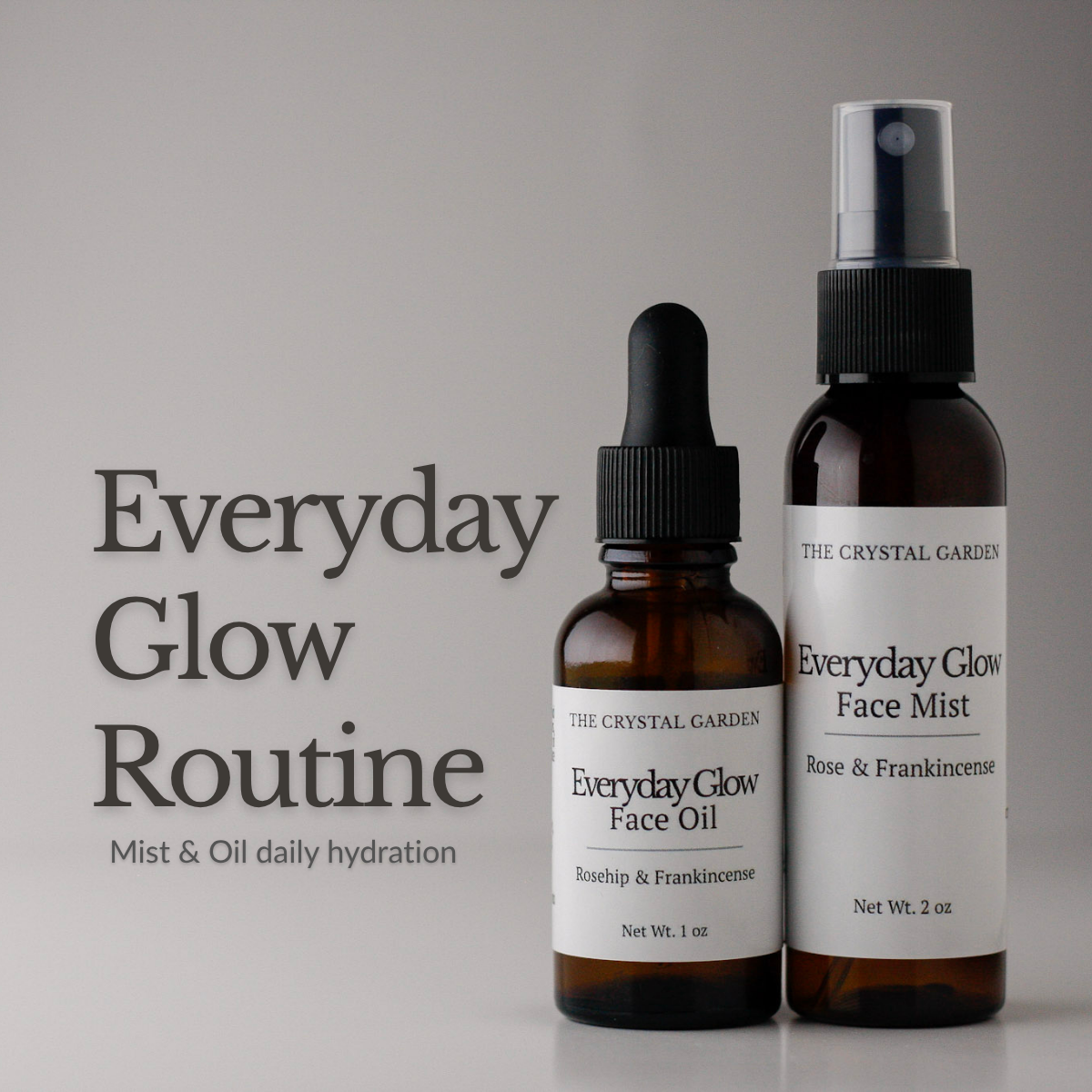 Two amber skincare bottles from The Crystal Garden on a light gray background. The left bottle is a dropper bottle of Everyday Glow Face Oil, and the right bottle is a spray bottle of Everyday Glow Face Mist.
