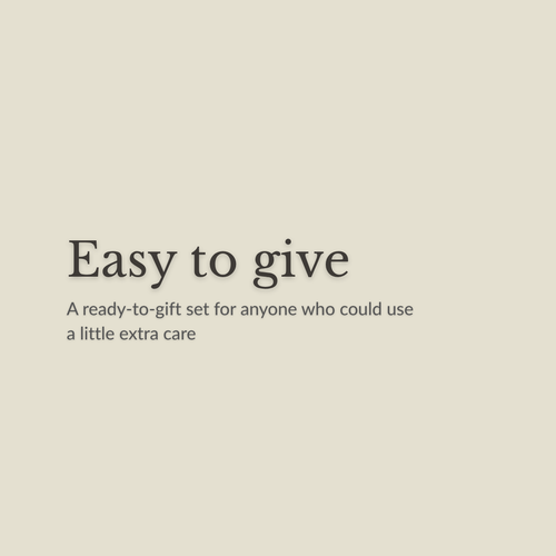 A minimalist beige graphic with dark gray text reading 'Easy to give' and smaller text below, 'A ready-to-gift set for anyone who could use a little extra care.' No physical product is shown.