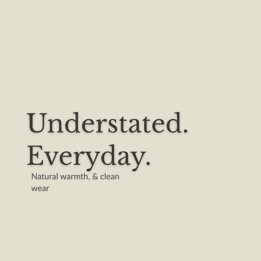 A minimalist beige graphic with the text 'Understated. Everyday.