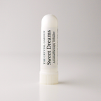 A white cylindrical aromatherapy inhaler tube standing upright on a light gray background. The label reads 'THE CRYSTAL GARDEN Sweet Dreams Aromatherapy Inhaler' in black text.
