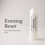 A white cylindrical aromatherapy inhaler tube labeled 'The Crystal Garden Serenity' stands on a light gray background next to text reading 'Evening Reset' and 'Calm breath & grounded ritual'.