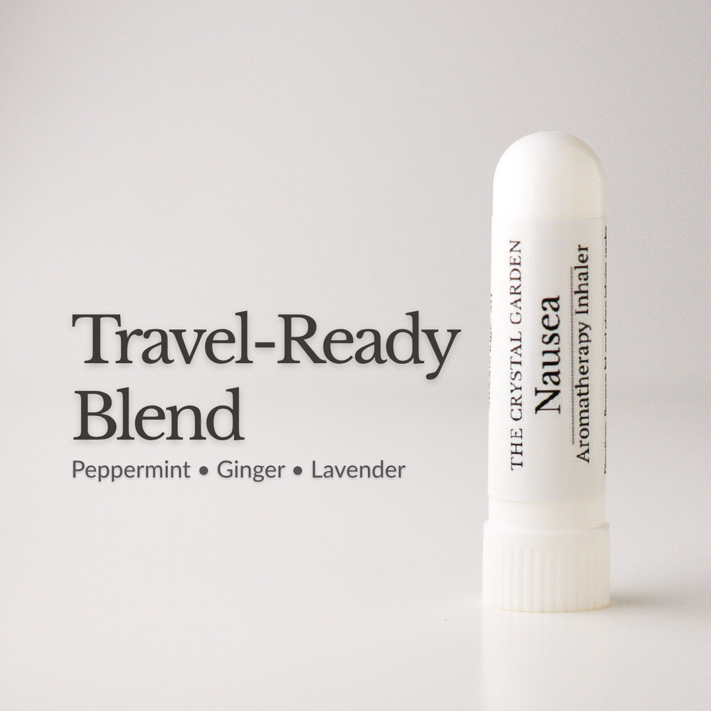 A white travel-ready nausea inhaler by The Crystal Garden stands on a white surface against a light gray background, next to the text 'Travel-Ready Blend' and 'Peppermint • Ginger • Lavender'.