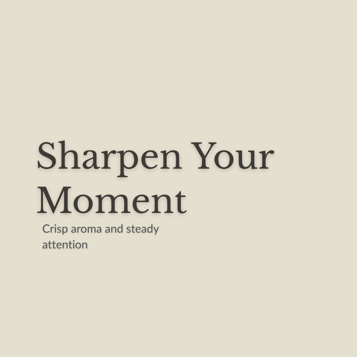 A minimalist square graphic with the phrase 'Sharpen Your Moment' in large dark serif text and the smaller subtitle 'Crisp aroma and steady attention' on a warm light beige background.