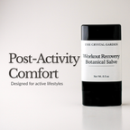 A black and white stick of The Crystal Garden Workout Recovery Botanical Salve stands on a white surface next to the text 'Post-Activity Comfort' on a clean white background.