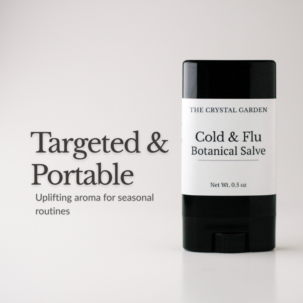 A black and white stick of 'The Crystal Garden' Cold & Flu Botanical Salve stands on a white surface next to promotional text that reads 'Targeted & Portable'.